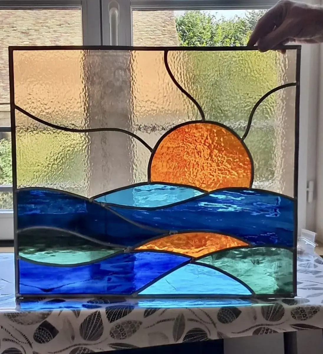 Vitrail coucher de soleil sur l'océan